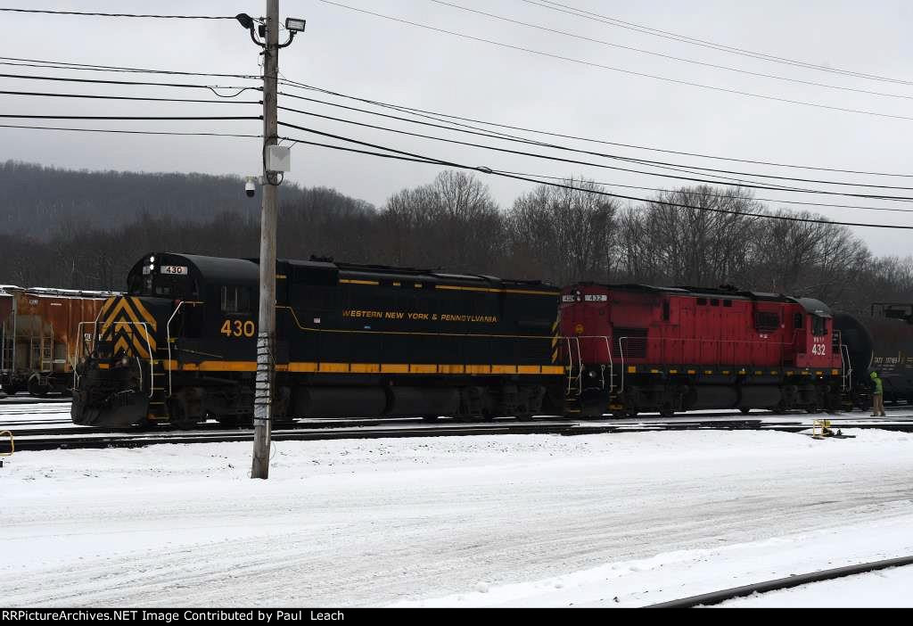 A pair of Alco's switch cars in the yard